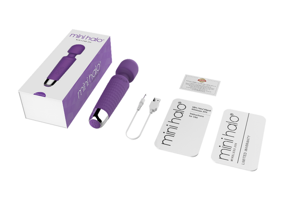 Shibari Mini Halo unboxed showing device, USB charging cable, and warranty cards
