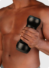 Shirtless model gripping Feel PowerBlow stroker single-handed, ergonomic hourglass body shape