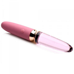 Side angle of 10X Rosé vibrator highlighting gold ring join between pink silicone and glass end