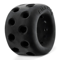 Side angle of Airballs black ball stretcher showing textured vent-hole pattern across outer surface