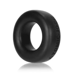 Side angle of black Oxballs COCK-T ring showing Atomic Jock branding and smooth finish