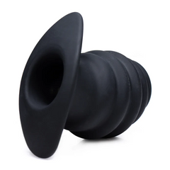 Side angle of black silicone hollow anal plug showing open tunnel and ribbed tapered body