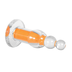 Side angle of clear plug showing ribbed shaft, wide base, and layered ball-tip design