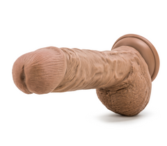 Side-angle view of Coverboy Latin dildo showing realistic textured shaft and suction cup base