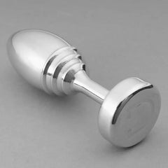 Side angle of the Doxy Ribbed Butt Plug laying flat, highlighting the tapered oval tip and ribbed stem