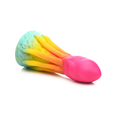 Side-angle view of King Kraken dildo lying flat, showing squid-head tip and base tentacles