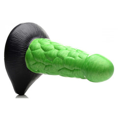Side angle of Radioactive Reptile dildo highlighting scale relief and broad suction cup