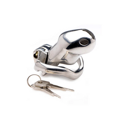Side angle of Rikers steel chastity cage locked closed with keys resting beside it