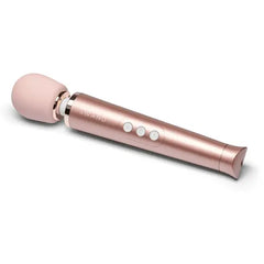 Side angle of rose gold Le Wand Petite showing three control buttons on handle
