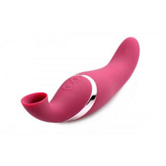 Side-angle view of Shegasm Intense 2-in-1 stimulator lying flat, highlighting silver accent band and control buttons