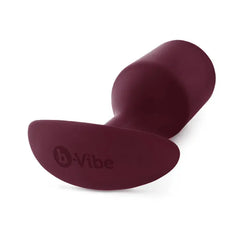 Side-angle view of Snug Plug 5 base displaying b-Vibe logo on flat anchor stabilizer