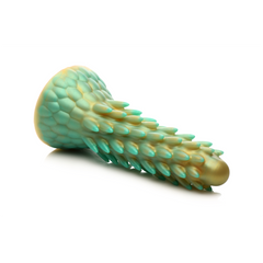 Side angle of teal and gold Stegosaurus dildo showing spiked body and wide suction cup base