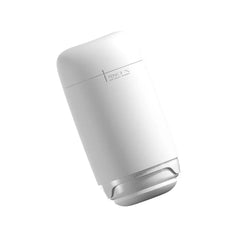 Side angle of Tenga Puffy Sugar White male masturbator showing contoured ergonomic casing