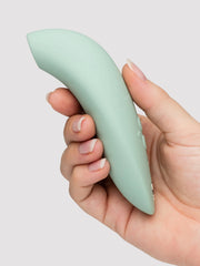 Side angle of We-Vibe Melt 2 highlighting its ergonomic curved shape in soft green silicone