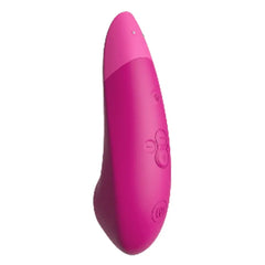 Side angle of Womanizer Enhance highlighting smooth silicone body and button layout