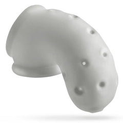 Side-angled view of Airlock chastity cage showing raised ventilation dots along curved body