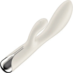 Close-up side view of beige silicone rabbit vibrator with chrome base and control button