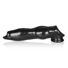 Side view of the black FIDO beast cocksheath displaying the wavy ridged shaft texture along its length