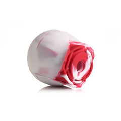 Side view of Bloomgasm Swirl rose-shaped silicone suction stimulator in red and white marbled design