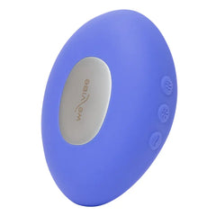 Side view of blue silicone We-Vibe Temp with oval metallic panel and three buttons