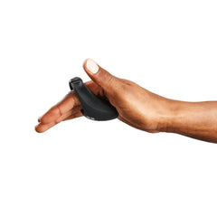 Side view of Bond cock ring worn on two fingers, highlighting its flexible silicone fit