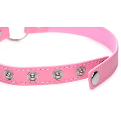 Side detail of pink Kinky Kitty choker showing snap fastener and evenly spaced silver rivets along band