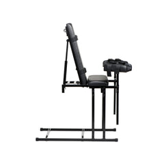 Side view of Extreme Obedience Chair in upright seated configuration with stirrups fully extended