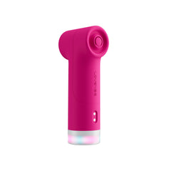 Side view of the Fizz vibrator with illuminated rainbow charging base and Lovense branding visible