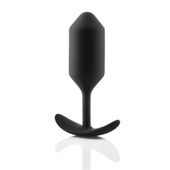 Side profile of b-Vibe Snug Plug 3 showing tapered silicone body and curved retention base