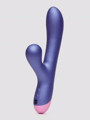 Side profile of blue-purple rabbit vibrator with rounded clitoral head and pink base, ROMP branding