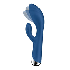 Side profile of blue rabbit vibrator with shaft rotation motion indicated by ghost overlay
