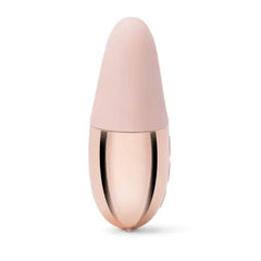 Side profile of blush pink silicone body meeting rose gold base of the Double Vibe