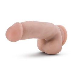 Side profile of Coverboy Pizza Boy beige dildo showing realistic curved shape and suction base
