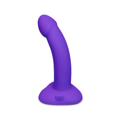 Side profile of curved purple silicone dildo standing upright on suction base with control button