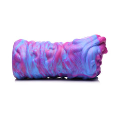 Side profile of Cyclone alien stroker displaying full ribbed and swirled blue-pink exterior texture