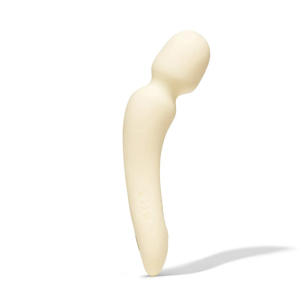 Side profile of Dame Min Mini Wand in butter, highlighting the curved ergonomic handle shape