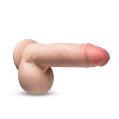 Side profile of the K Pop Star realistic dildo displaying natural skin tone and detailed texture