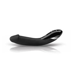 Side profile of Mystim Tickling Truman vibrator lying flat, showing curved silicone shaft