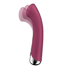 Side profile of Spinning G-Spot 1 curved silicone shaft with rotating head motion illustrated