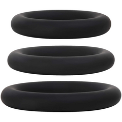 Side profile of three black silicone cock rings stacked, showing smooth rounded cross-section