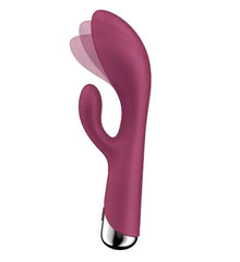 Close-up side view of red rabbit vibrator tip showing spinning shaft rotation movement detail