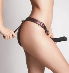 Side view of Strap-On-Me Generous harness showing adjustable gold-tone waist buckle and strap detail