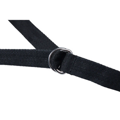 Close-up of silver D-ring connector joining two black nylon webbing straps at centre