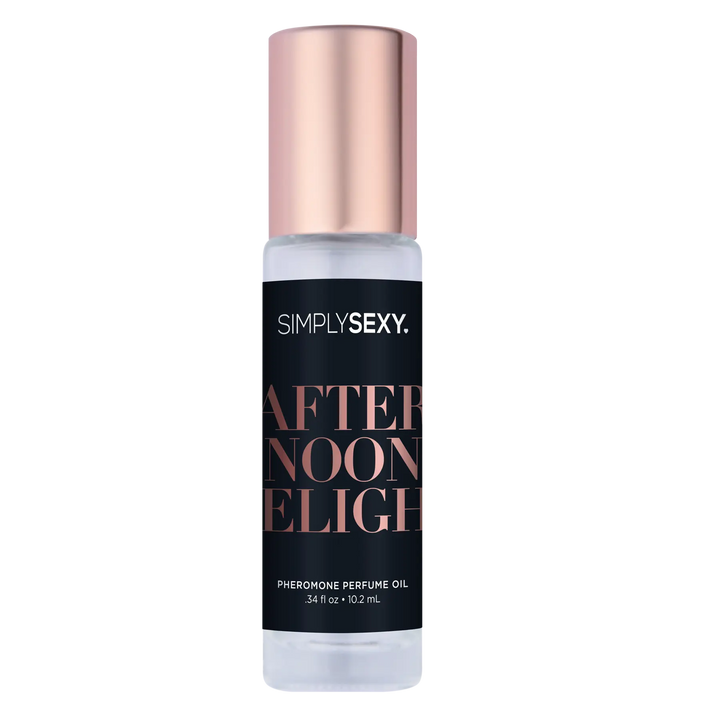 Simply Sexy Afternoon Delight pheromone perfume oil in a clear glass roll-on bottle with rose gold cap