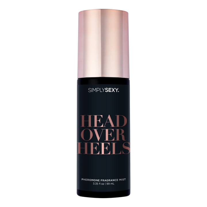 Simply Sexy Head Over Heels pheromone fragrance mist in a sleek black bottle with rose-gold cap