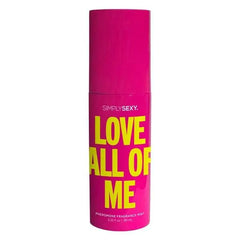 Simply Sexy Love All of Me Pheromone Fragrance Mist in bold pink cylindrical bottle with yellow text