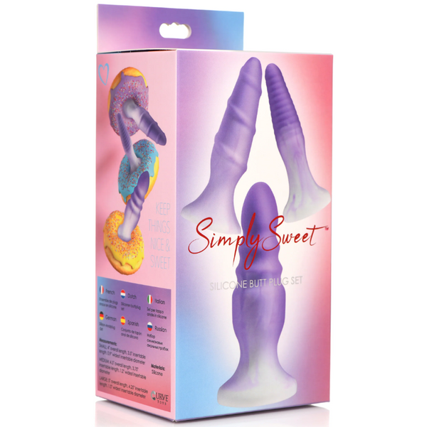 Simply Sweet silicone butt plug set shown inside its pink and purple retail packaging