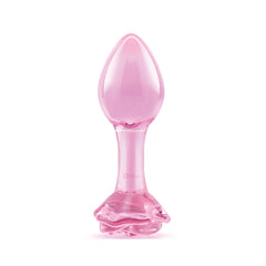 Single pink glass plug standing upright, highlighting tapered tip and flared rose base