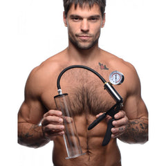 Size Matters Penis Pump Kit held by male model, showing clear cylinder and pistol-grip handle