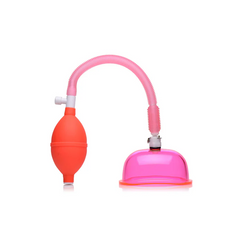 Size Matters Vaginal Pump with pink polycarbonate cup and orange squeeze bulb on white background